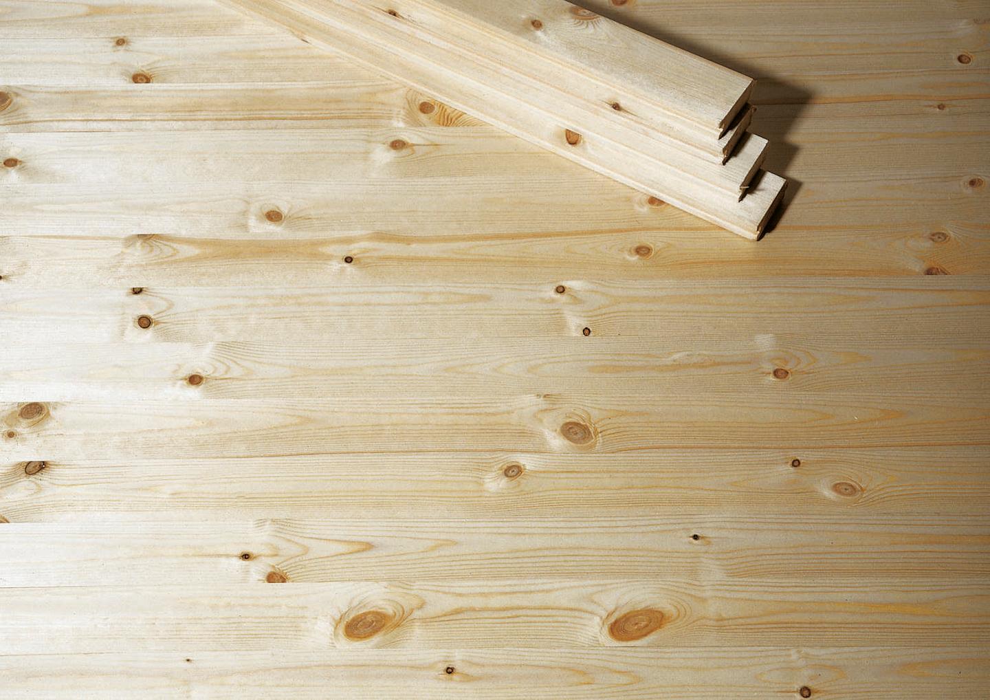 Mökkilattialauta 28x95 oksamänty päätypontattu