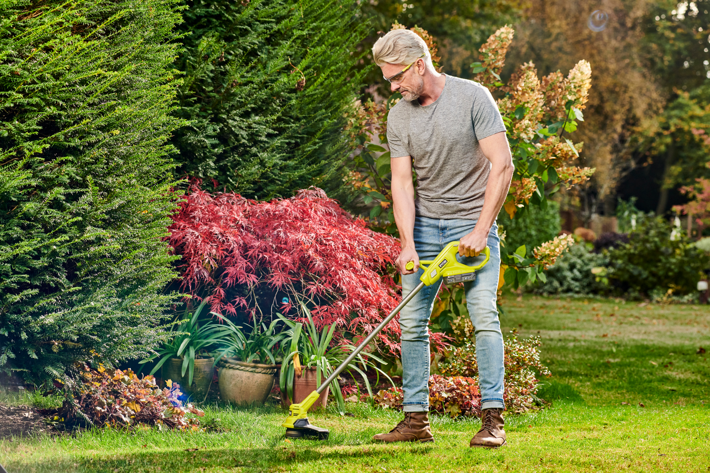 Akkutrimmeri Ryobi RY18LT23A-120 18V ONE+ 1x2,0Ah