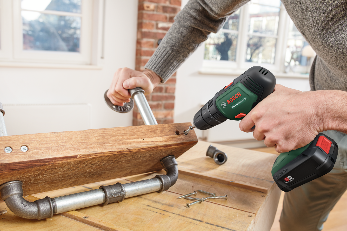 Akkuiskuporakone Bosch UniversalImpact 18V 1,5Ah 2,5Ah Systembox 46 osaa