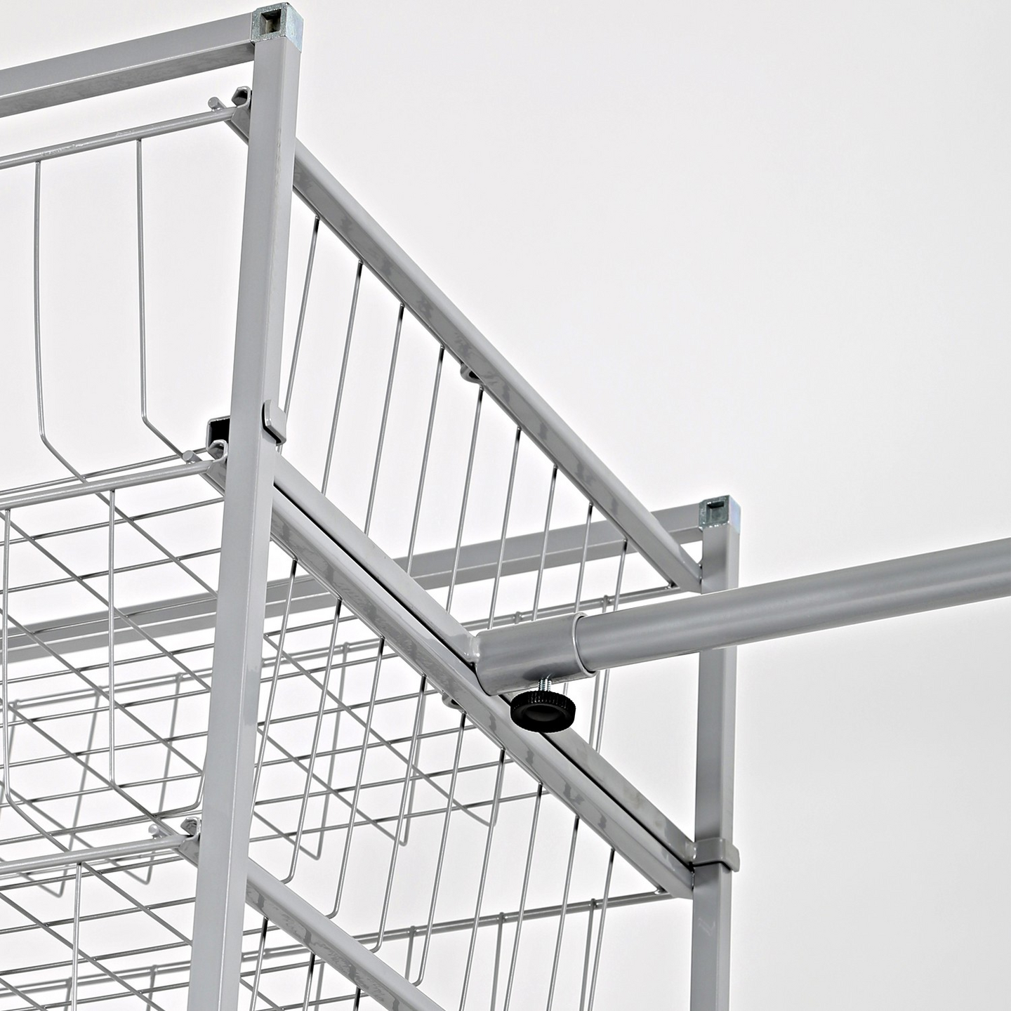 Vaatetangon kannatin LM 383 koritelineelle valkoinen