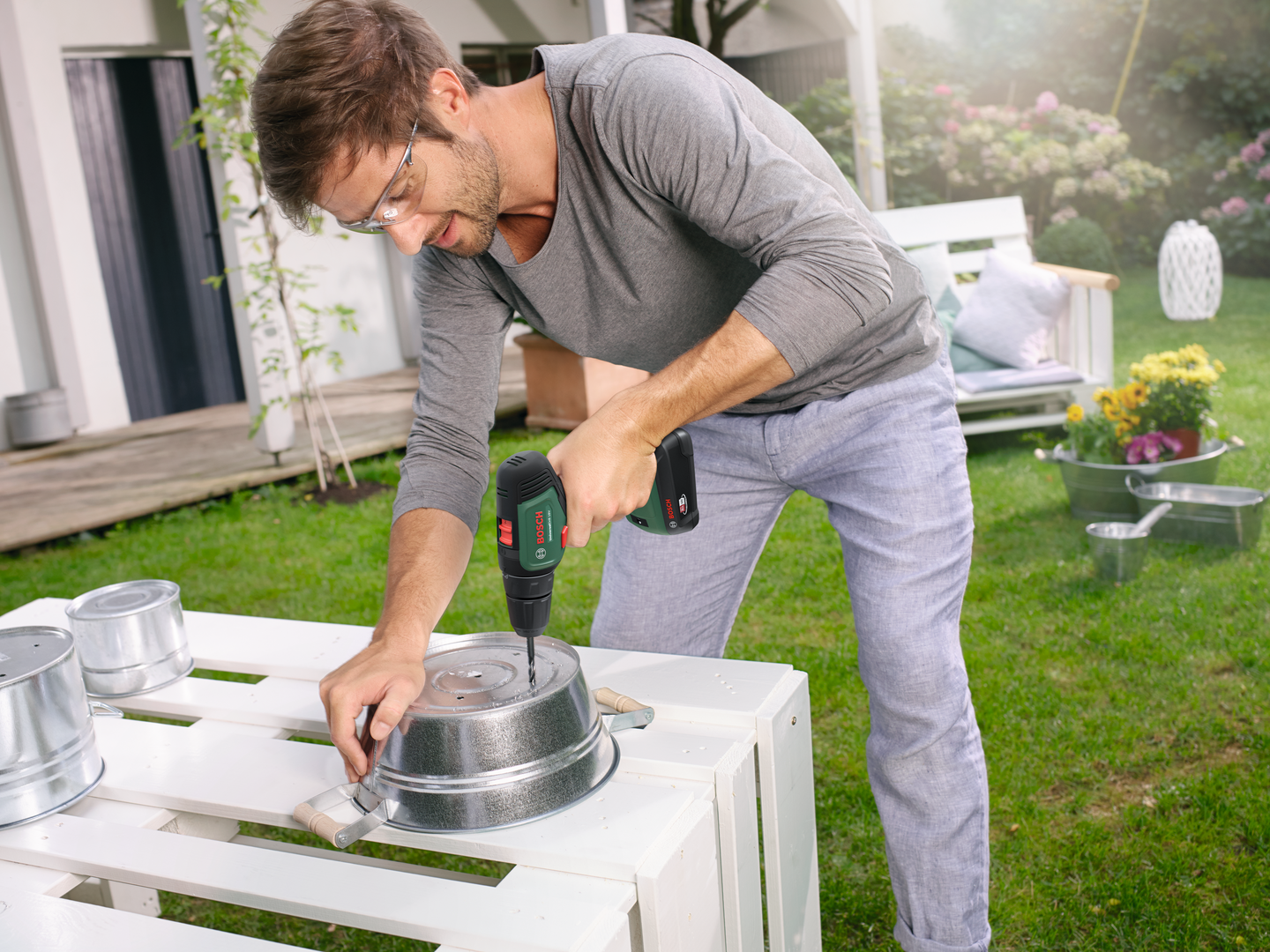 Akkuporakone Bosch UniversalDrill 18V 2x1,5Ah + Systembox