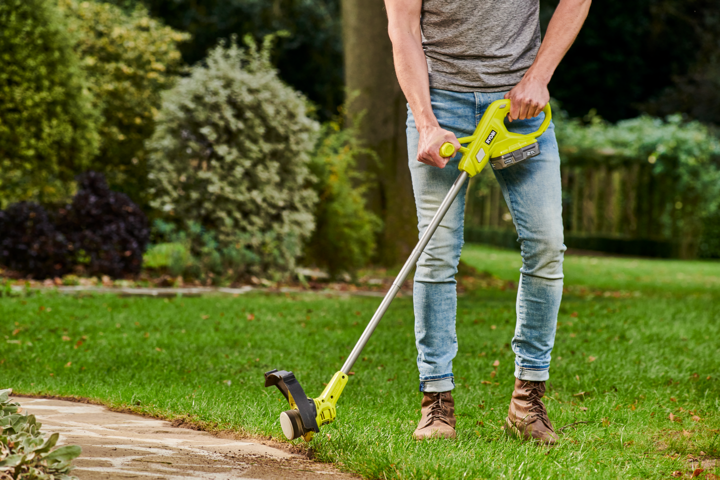 Akkutrimmeri Ryobi RY18LT23A-220 18V ONE+ 2x2,0Ah