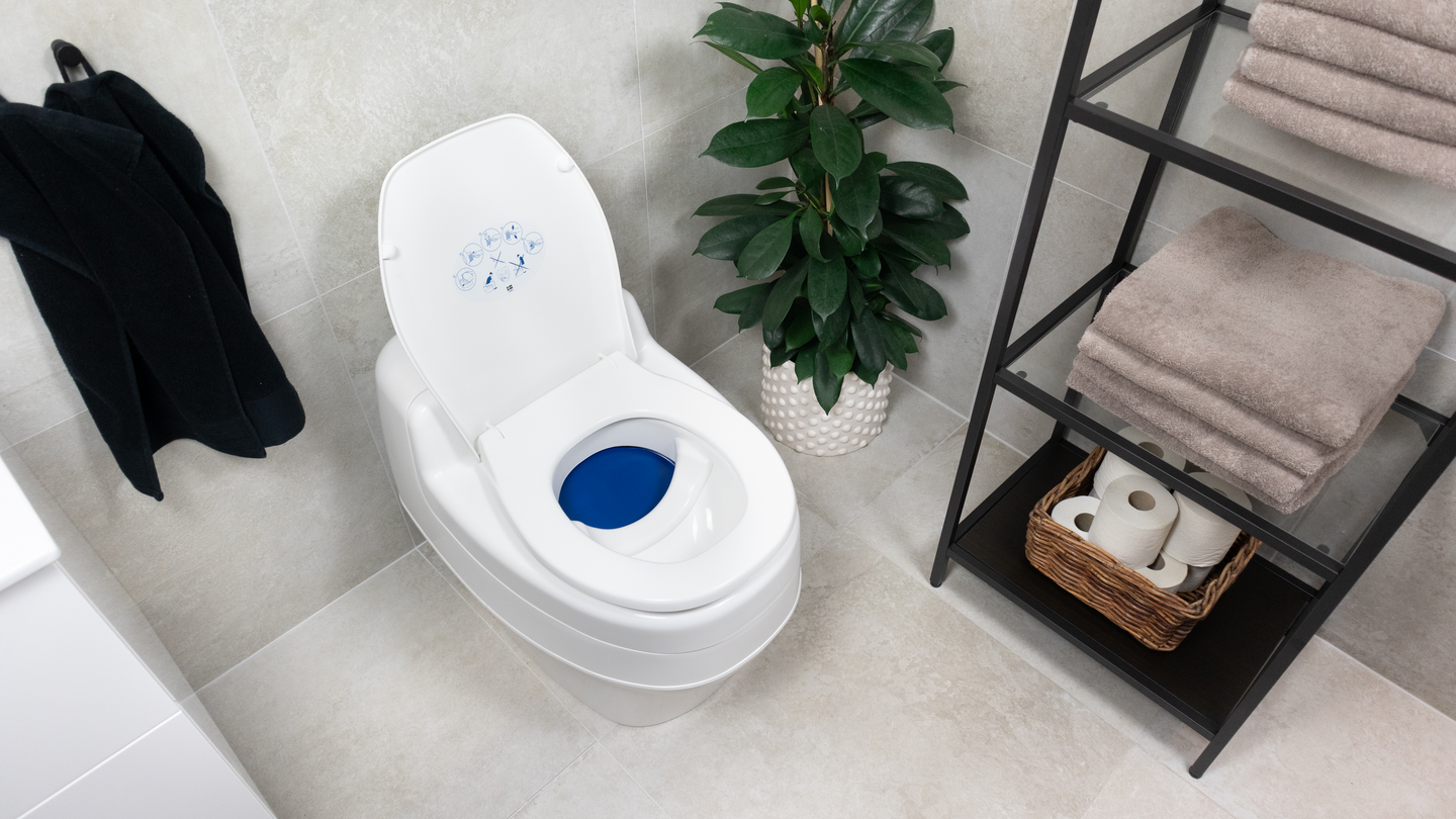 Erotteleva käymälä Separett Villa 12/220V