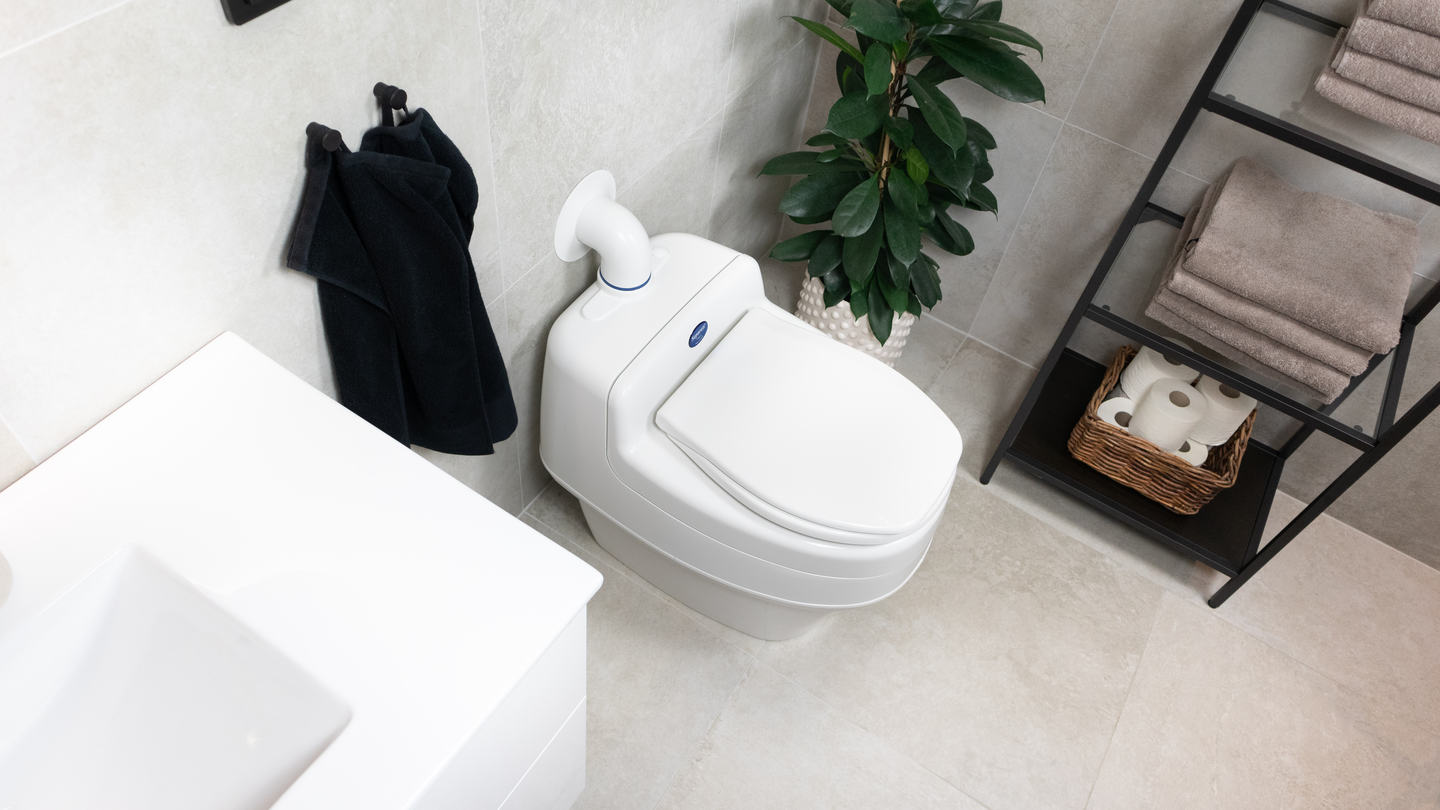 Erotteleva käymälä Separett Villa 12/220V