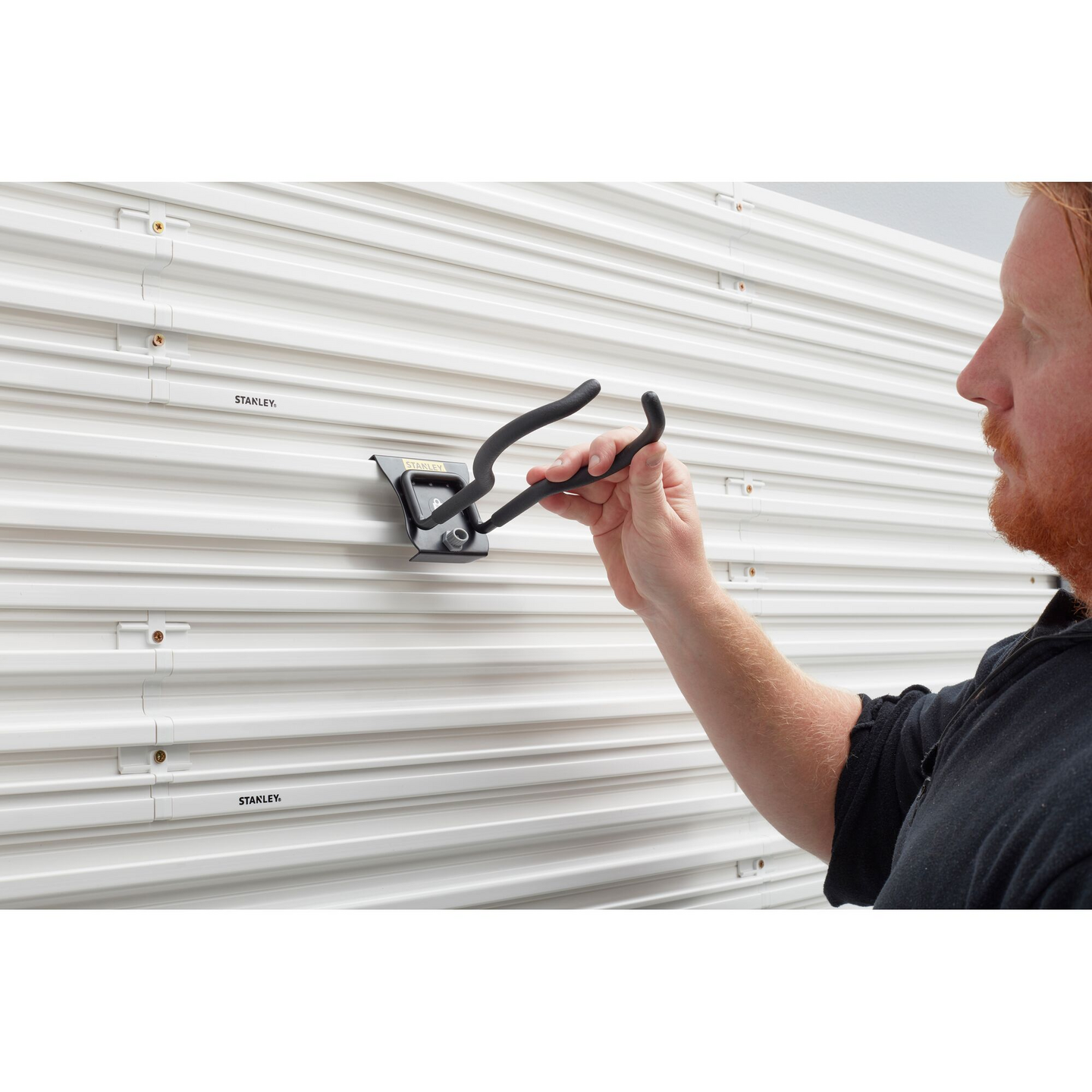 Säilytyskoukku sähkötyökaluille Stanley Trackwall