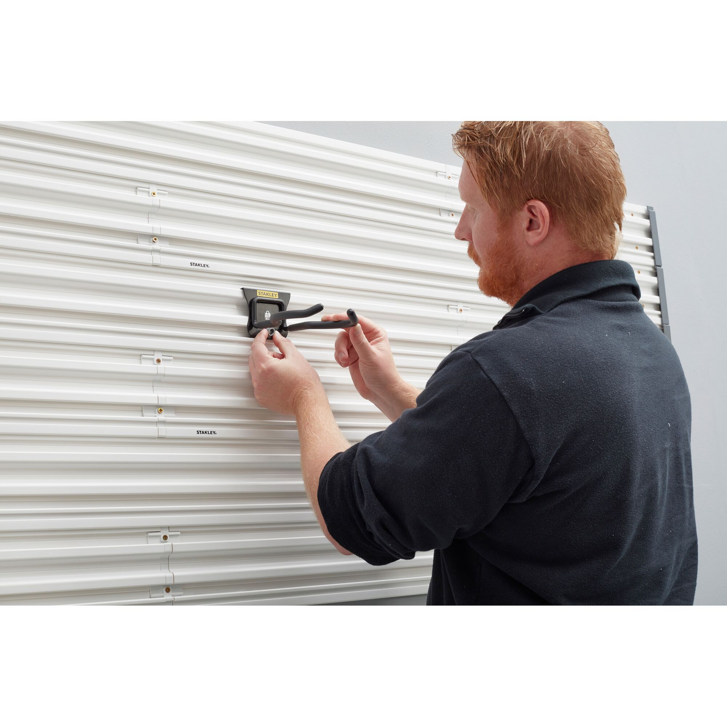 Säilytyskoukku sähkötyökaluille Stanley Trackwall