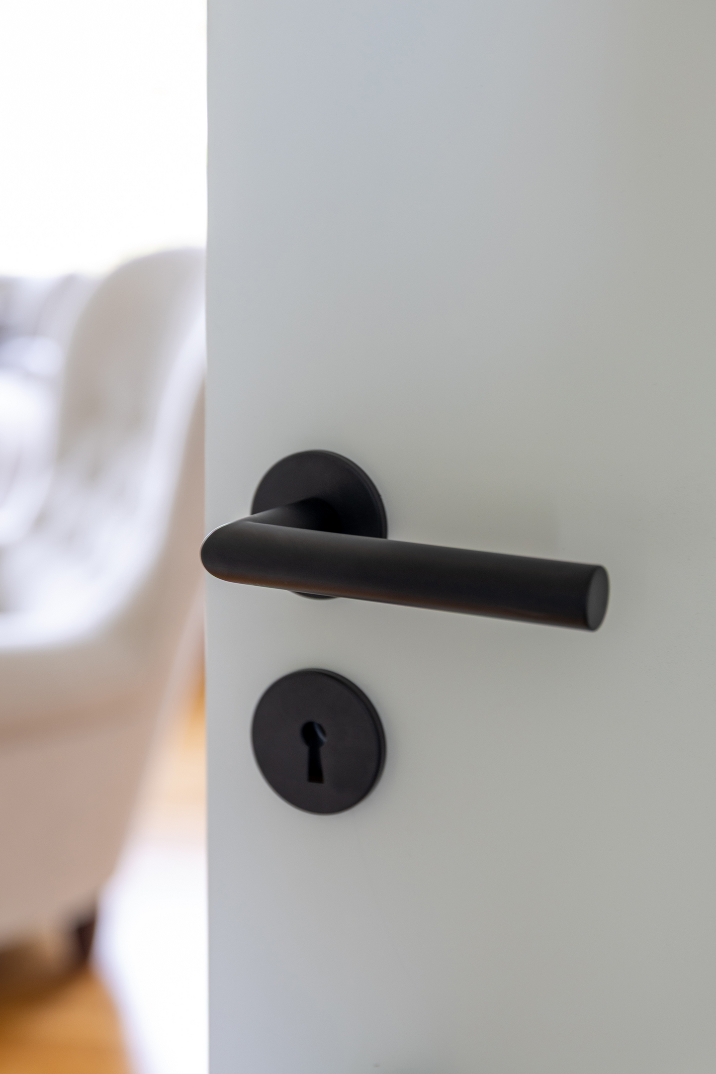 DÖRRHANDTAG HABO PHOENIX SVART, MED NYCKELSKYLT PP