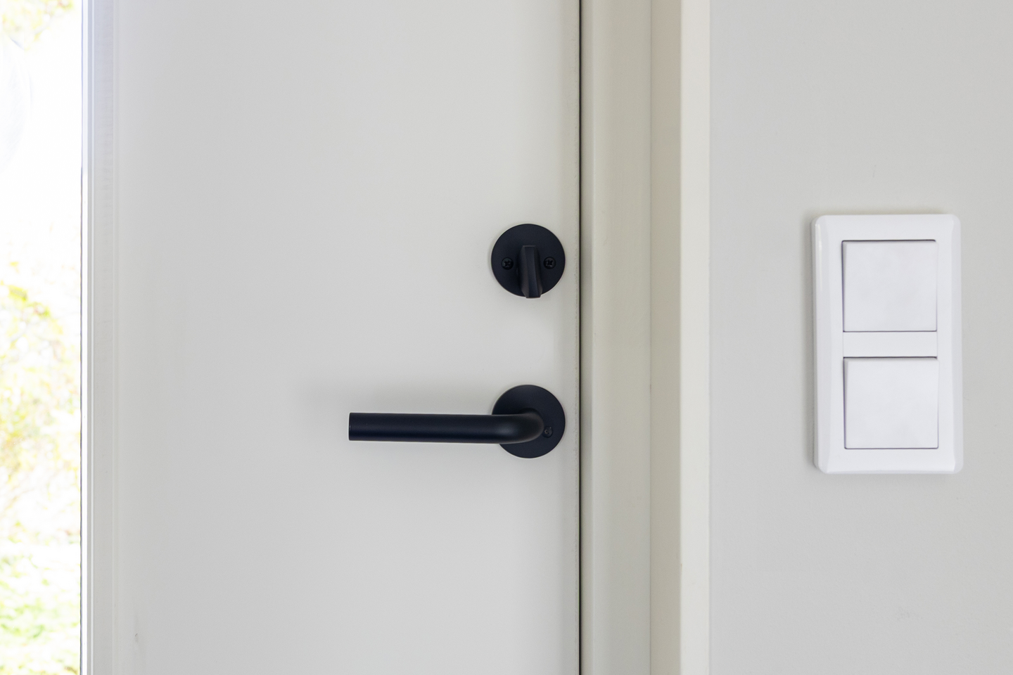 DÖRRHANDTAG HABO PORTLAND SVART, MED RETURFJÄDER PP