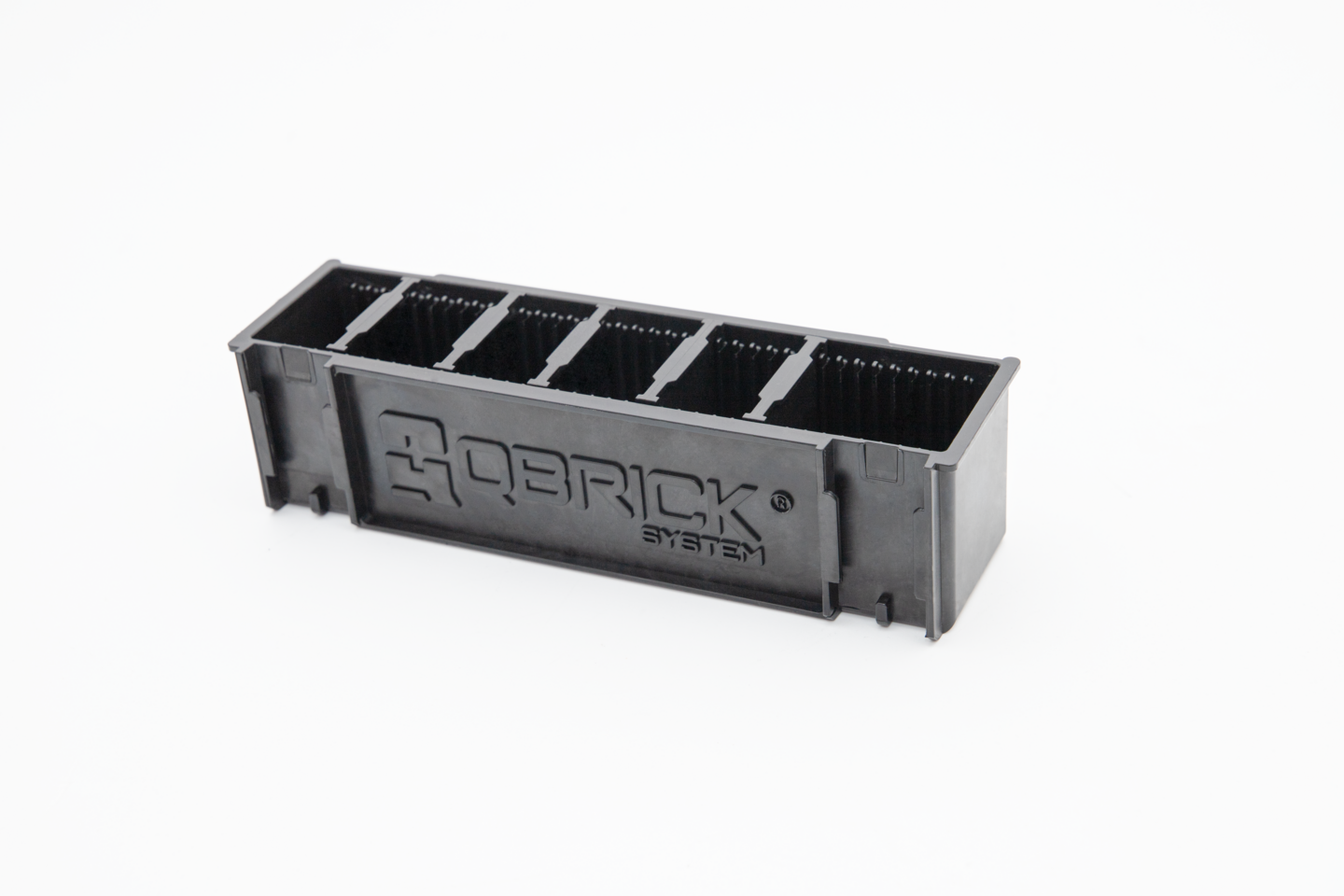 Pidike Qbrick pitkille tuotteille