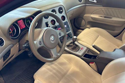 punainen Alfa Romeo 159 2006 kuva 6.