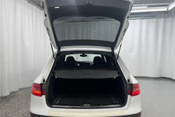 Valkoinen Audi A4 allroad quattro 2013 kuva 11.
