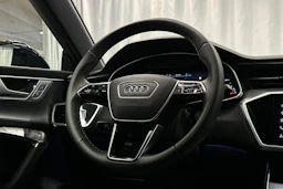 sininen Audi A7 2025 kuva 19.