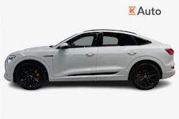 Valkoinen Audi e-tron 2022 kuva 7.