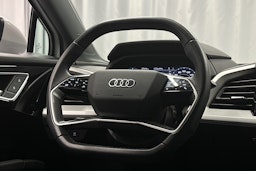 valkoinen Audi Q4 e-tron 2024 kuva 18.