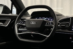 musta Audi Q4 e-tron 2024 kuva 18.