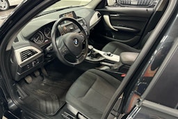 musta BMW 114 2014 kuva 6.