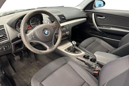 musta BMW 116 2009 kuva 7.
