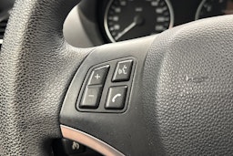musta BMW 116 2009 kuva 17.