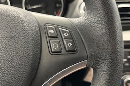 musta BMW 116 2009 kuva 18.