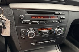 musta BMW 116 2009 kuva 21.