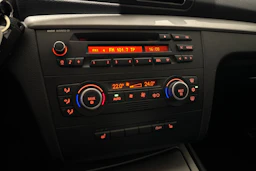 musta BMW 116 2009 kuva 22.