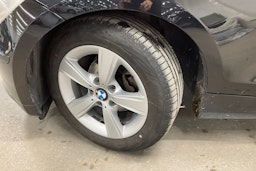 musta BMW 116 2011 kuva 13.