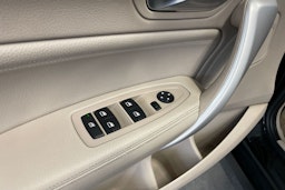 musta BMW 116 2011 kuva 16.