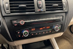 musta BMW 116 2011 kuva 18.