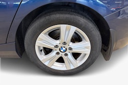 sininen BMW 116 2012 kuva 9.