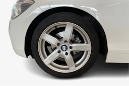 valkoinen BMW 116 2013 kuva 9.