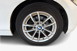 valkoinen BMW 116 2014 kuva 9.