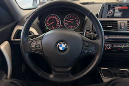 musta BMW 116 2015 kuva 13.