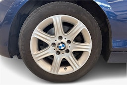Sininen BMW 118 2013 kuva 11.