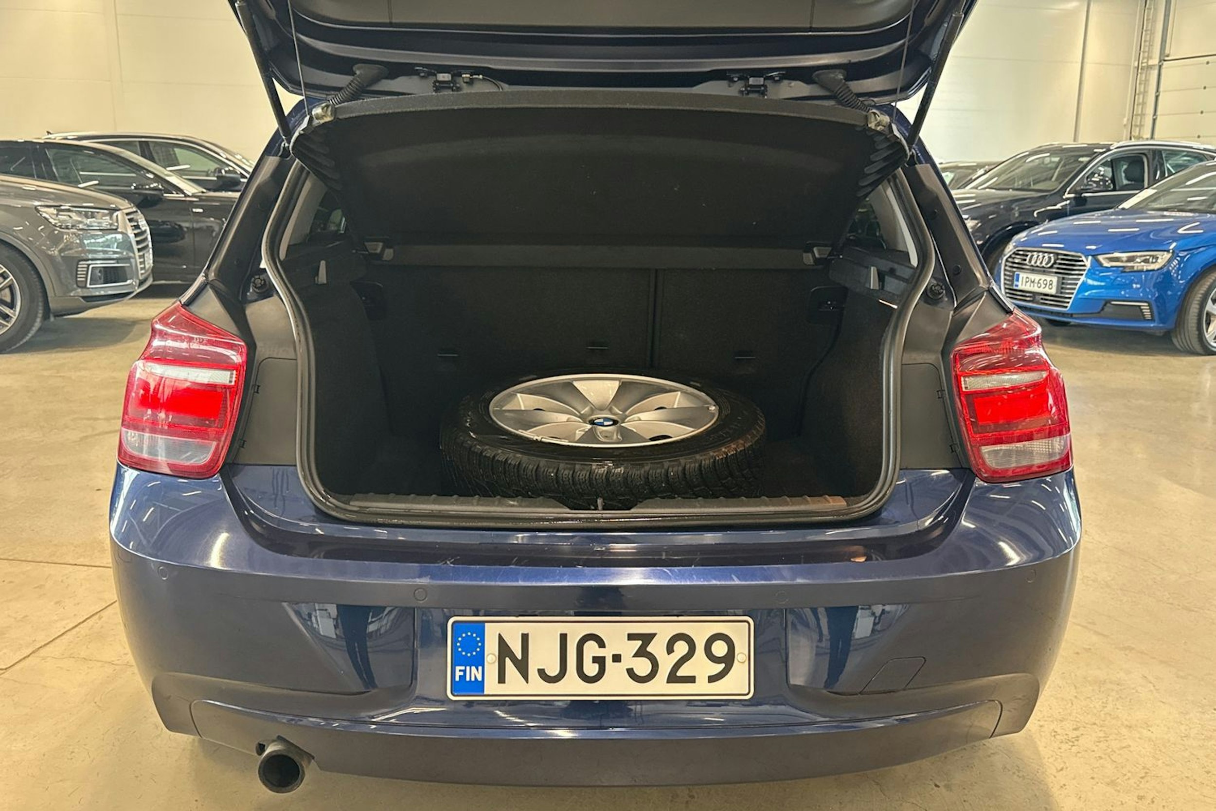 Sininen BMW 118 2013 kuva 14.