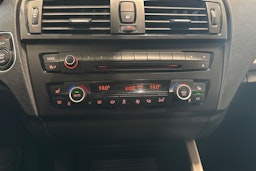 Sininen BMW 118 2013 kuva 21.
