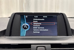harmaa BMW 118 2013 kuva 17.