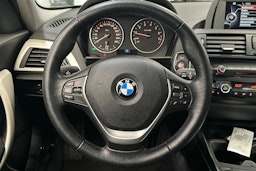 Musta BMW 118 2015 kuva 12.