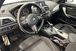 valkoinen BMW 118 2016 kuva 6.