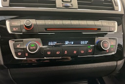 musta BMW 118 2016 kuva 17.