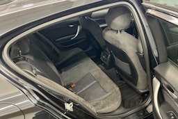 musta BMW 135 2014 kuva 14.