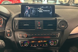 musta BMW 135 2014 kuva 18.