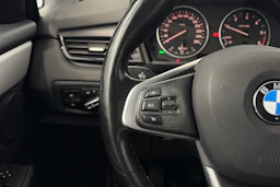valkoinen BMW 216 2015 kuva 18.