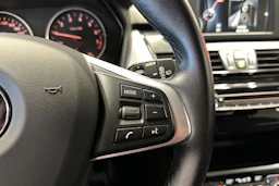 musta BMW 216 2016 kuva 22.