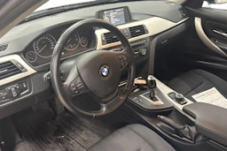 musta BMW 316 2013 kuva 3.