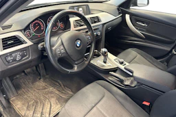 musta BMW 316 2015 kuva 3.