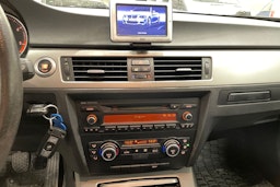 musta BMW 318 2008 kuva 12.