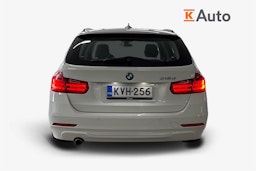 Valkoinen BMW 318 2013 kuva 3.