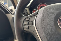Valkoinen BMW 318 2013 kuva 16.
