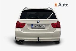 valkoinen BMW 320 2009 kuva 3.