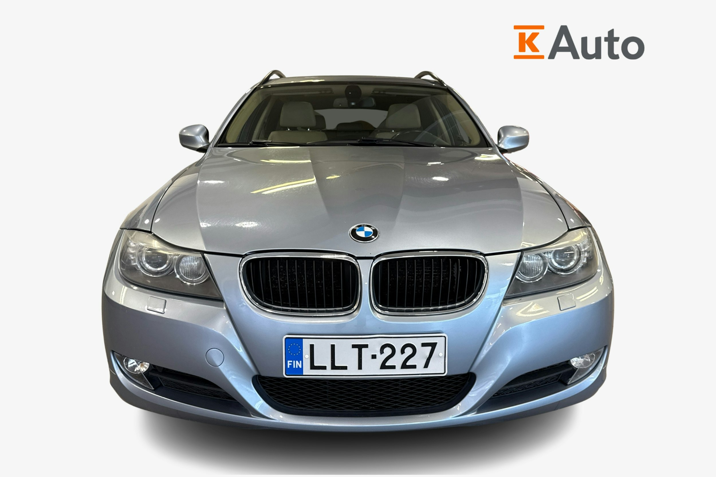sininen BMW 320 2010 kuva 4.